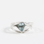 “Sterling silver ring with an aquamarine gemstone, shown front-facing on a white background.
