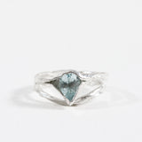 “Sterling silver ring with an aquamarine gemstone, shown front-facing on a white background.