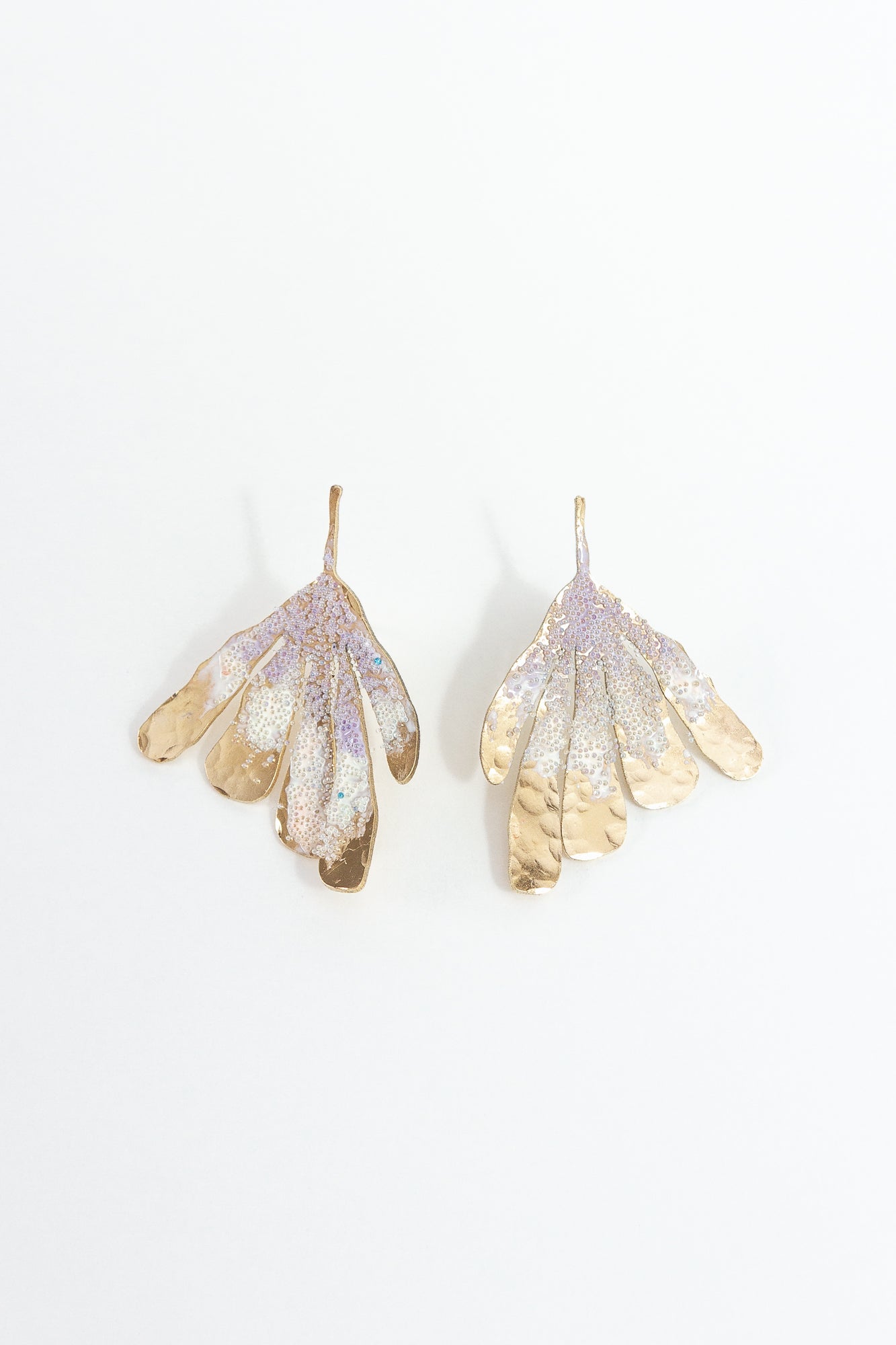 Complete pair of Lavender Flower Wing Earrings on a white background, botanical design in gold-plated brass.