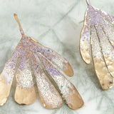 Lavender Flower Wing Earrings photographed close up, showing glass pearls and handcrafted finish.