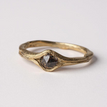 Front-side view of the 10k yellow gold salt-and-pepper diamond ring on a white background.