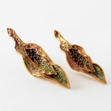 “Pair of Lettuce Leaf Earrings in gold-plated brass hand-painted  rust—with glass granulation detail, displayed on a white background.