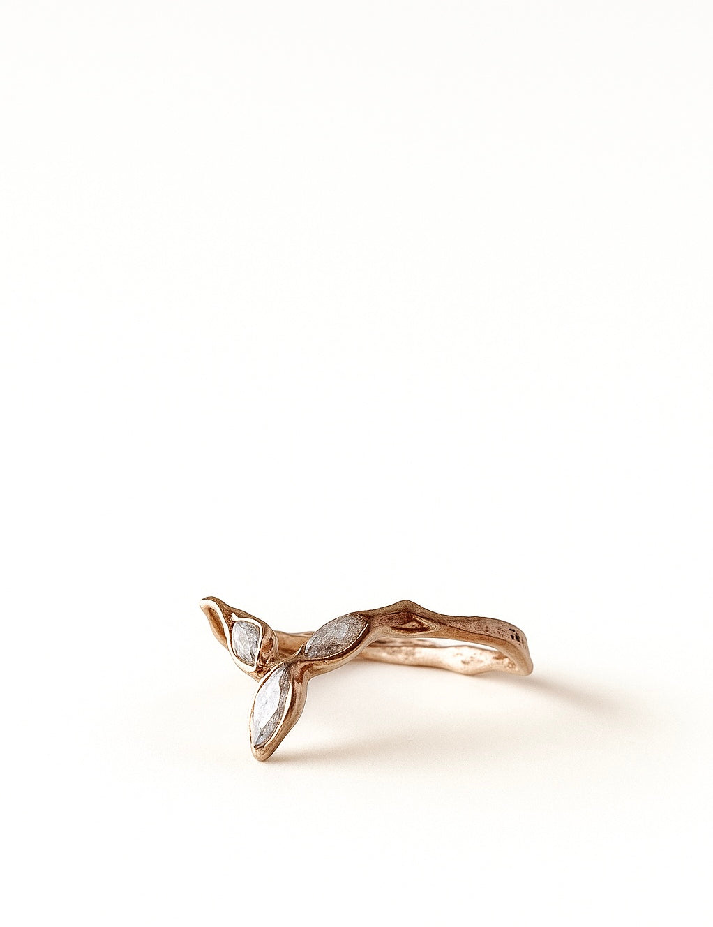 Top view of the rose gold zircon Marqueza ring highlighting its asymmetric, natural lines.