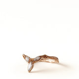 Top view of the rose gold zircon Marqueza ring highlighting its asymmetric, natural lines.
