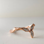 Back view of the Marqueza ring in rose gold, featuring organic hand-crafted texture and zircon setting.