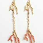 Gold-plated brass Root earrings with textured red tips and glass granulation on a white background.