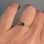 “Salt-and-pepper diamond ring in 10k yellow gold worn on the hand, photographed in cool lighting