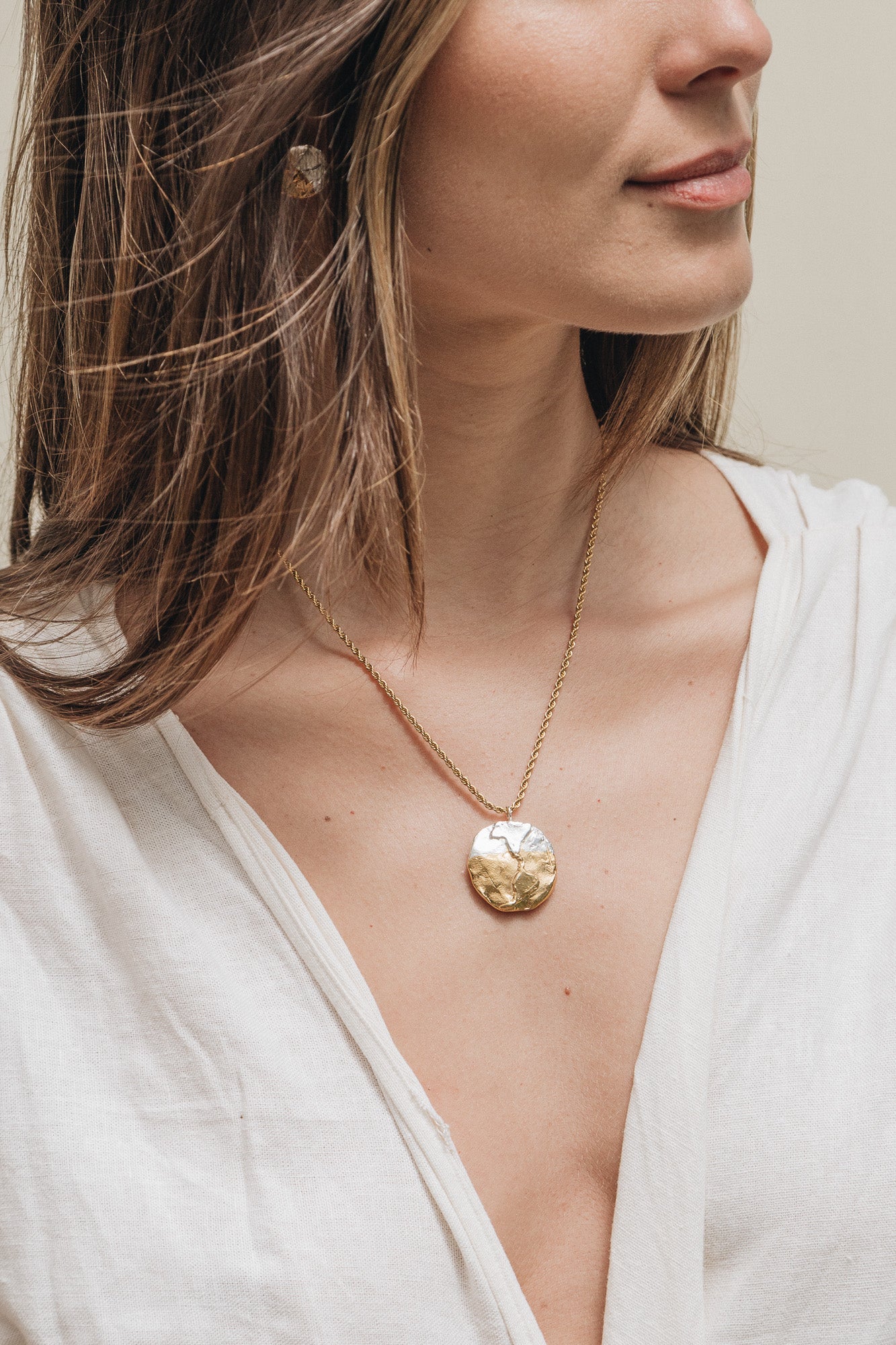 Gold earth sale necklace